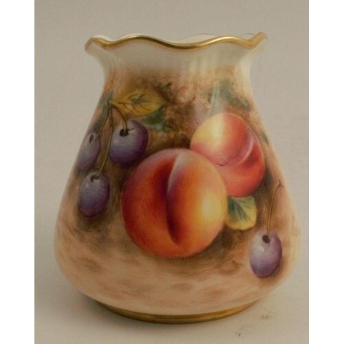 A Royal Worcester vase, decorated with half round hand paint...