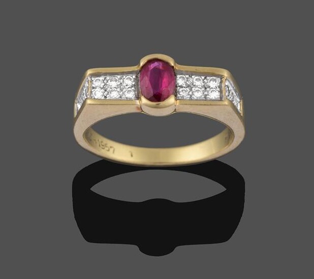 A Ruby and Diamond Ring, the oval cut ruby in...