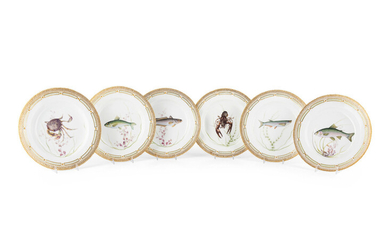 A Set of Twelve Royal Copenhagen Parcel Gilt Porcelain Fish Plates
