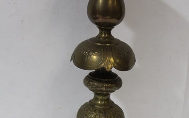 A Single Brass Ornate Candlestick