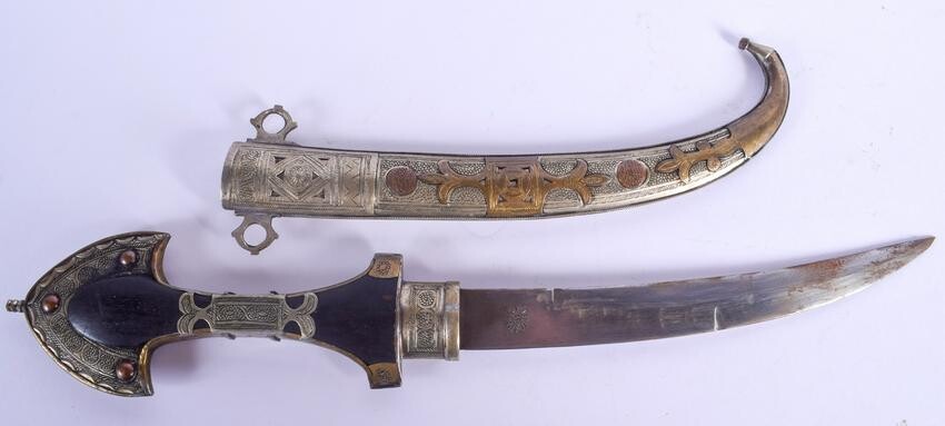 A VINTAGE MIDDLE EASTERN MIXED METAL INLAID DAGGER. 45