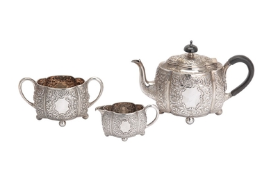 A Victorian sterling silver three-piece bachelor tea service, London 1886 by Horace Woodward & Co (E