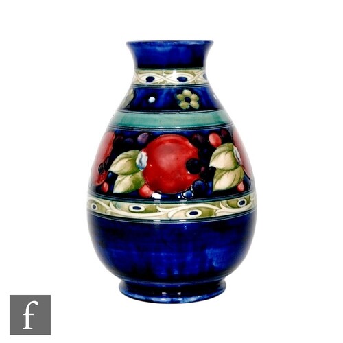 A William Moorcroft Banded Pomegranate pattern vase of ovoid...
