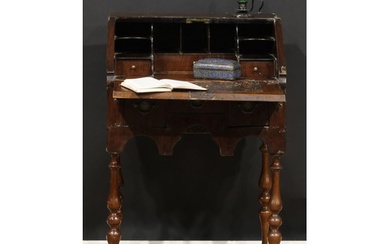 A William & Mary design walnut bureau, of small proportions,...