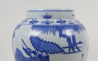 A blue and white porcelain jar decorated with warriors...