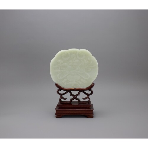 A celadon Jade ruyi shaped Plaque, 19th CenturyW: 14.6cm,H: ...