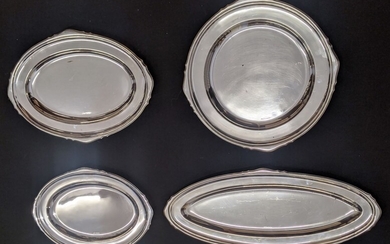 A collection of 4 Mappin & Webb silver platters,...