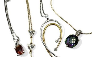 A collection of four 14ct gold pendants, to include a...