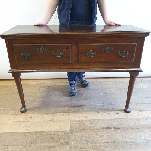 A fruitwood dresser, having two frieze drawers, on turned le...