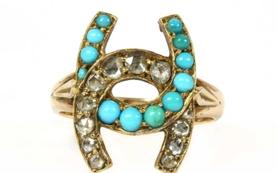 A gold diamond and turquoise horseshoe ring
