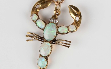 A gold, opal and colourless gem set scorpion pendant, the body mounted with oval and circular caboch