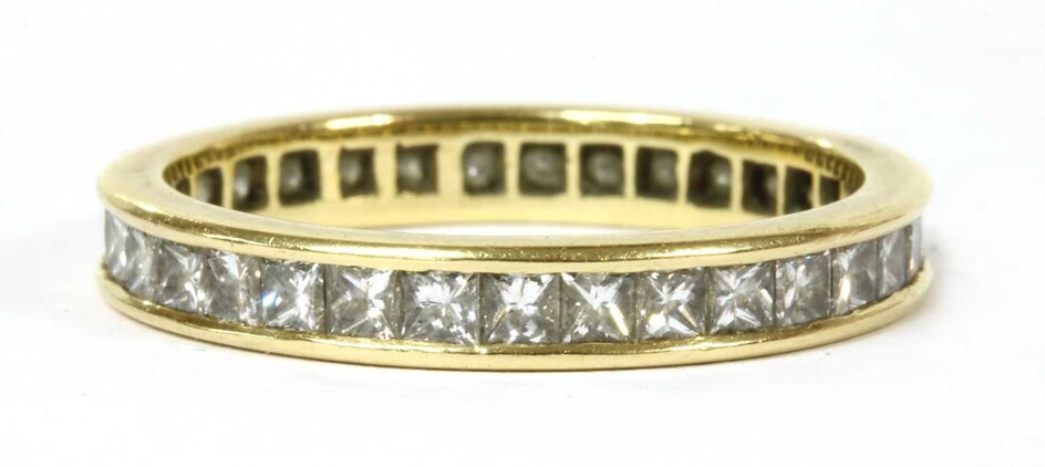 A gold princess cut diamond full eternity ring