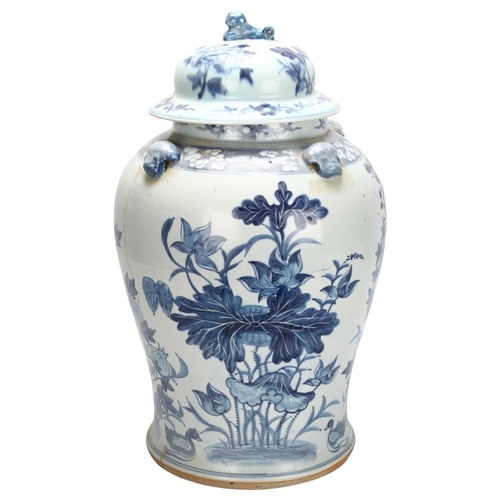 A large Chinese blue and white porcelain jar with floral dec...