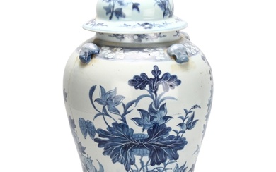 A large Chinese blue and white porcelain jar with floral dec...