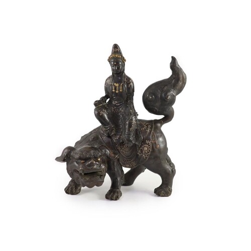 A large Chinese/Japanese bronze censer modelled as Wenshu ri...