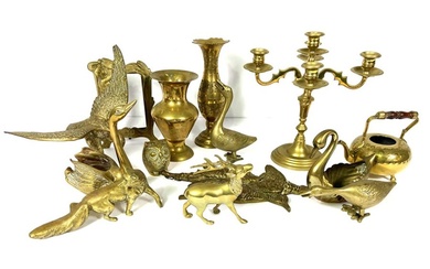 A large assortment of brass ornaments, candlesticks, dishes and related items (a lot)