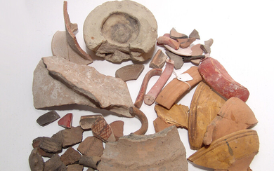 A large group of ancient pottery fragments