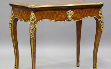 A late 19th century Louis XV style kingwood and parquetry veneered fold-over card table with gilt me