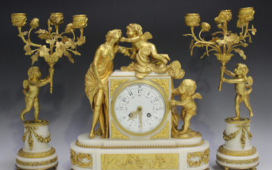 A late 19th century ormolu and white marble clock garniture, the clock with eight day movement strik