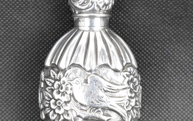 A late 19th/early 20th century hallmarked silver perfume bottle of...