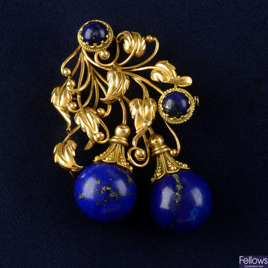 A mid 20th century 18ct gold and lapis lazuli floral brooch.