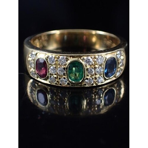 A mulit stone ring set with diamonds, estimated as emerald ....