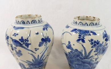 A pair of 18th century Dutch Delft lobed baluster vases, dec...