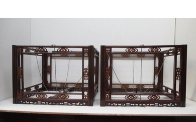A pair of 19th century Chinese tielimu and boxwood hanging l...