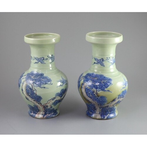 A pair of Chinese underglaze blue and copper red celadon gro...