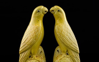 A pair of Chinese yellow-glazed parrots, Republic period
