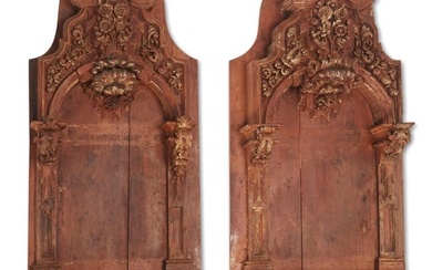 A pair of Continental Baroque-style carved wood niches