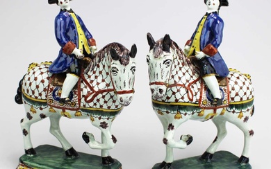 A pair of Delft polychrome pottery horse riders