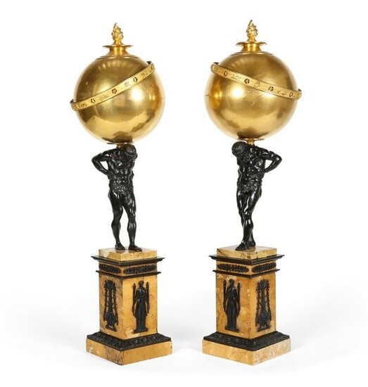 A pair of French bronze Atlas oil lamps