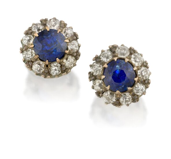 A pair of sapphire and diamond earrings, in the form of 19th century claw-set circular-cut sapphire and old-brilliant-cut diamond clusters, later converted to earstuds, post fittings, approx. width of clusters 9mm