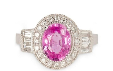 A pink sapphire, diamond and platinum ring