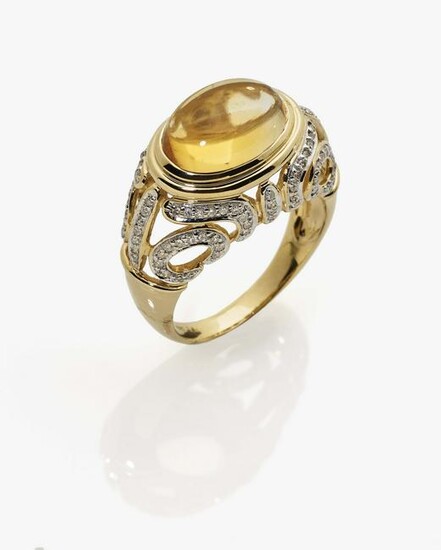 A ring with citrine and brilliant cut diamonds