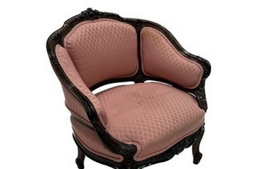 A rosewood boudoir fauteuil, of Louis XV design, serpentine ...