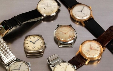A set of 7 vintage steel and metal watches with mechanical movements, Sam lip, Movado(2) and miscellaneous. As is.