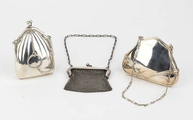 A set of three silver lady's coin purse -...
