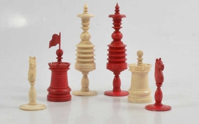 A stained bone chess set, all present, some slight losses.