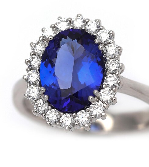 NOT SOLD. A tanzanite and diamond ring set with a tanzanite weighing app. 2.45 ct. encircled by numerous diamonds, mounted in 18k white gold. Size app. 53.5. – Bruun Rasmussen Auctioneers of Fine Art