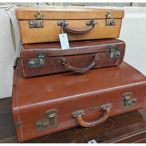 A vintage tan leather case, marked 'Tom Hill SW1' together w...