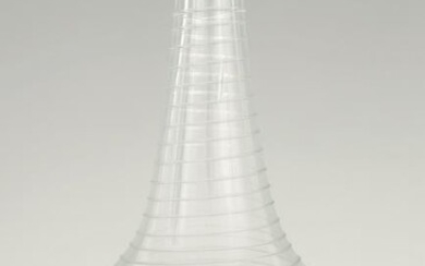 AN 18TH CENTURY CLEAR GLASS DECANTER with entwined