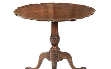 AN EARLY 19TH CENTURY MAHOGANY TILT TOP TABLE with...