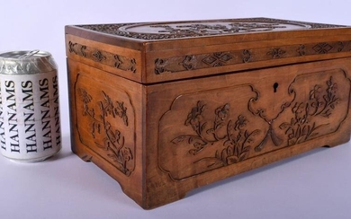AN EARLY 20TH CENTURY CHINESE CARVED SANDALWOOD CASKET