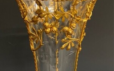 AN ORMOLU MOUNTED GLASS VASE