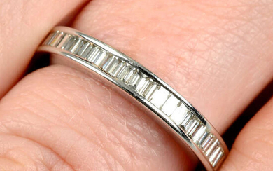 An 18ct gold baguette-cut diamond full eternity ring.