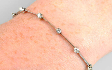 An 18ct gold diamond line bracelet, by David Morris.