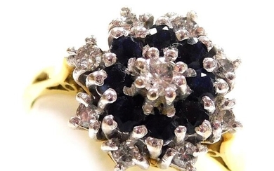 An 18ct gold sapphire and diamond flower head ring,...