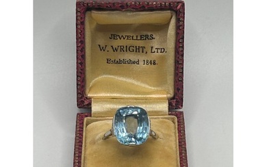 An 18ct white gold and blue stone ring, ring size M, in a vi...